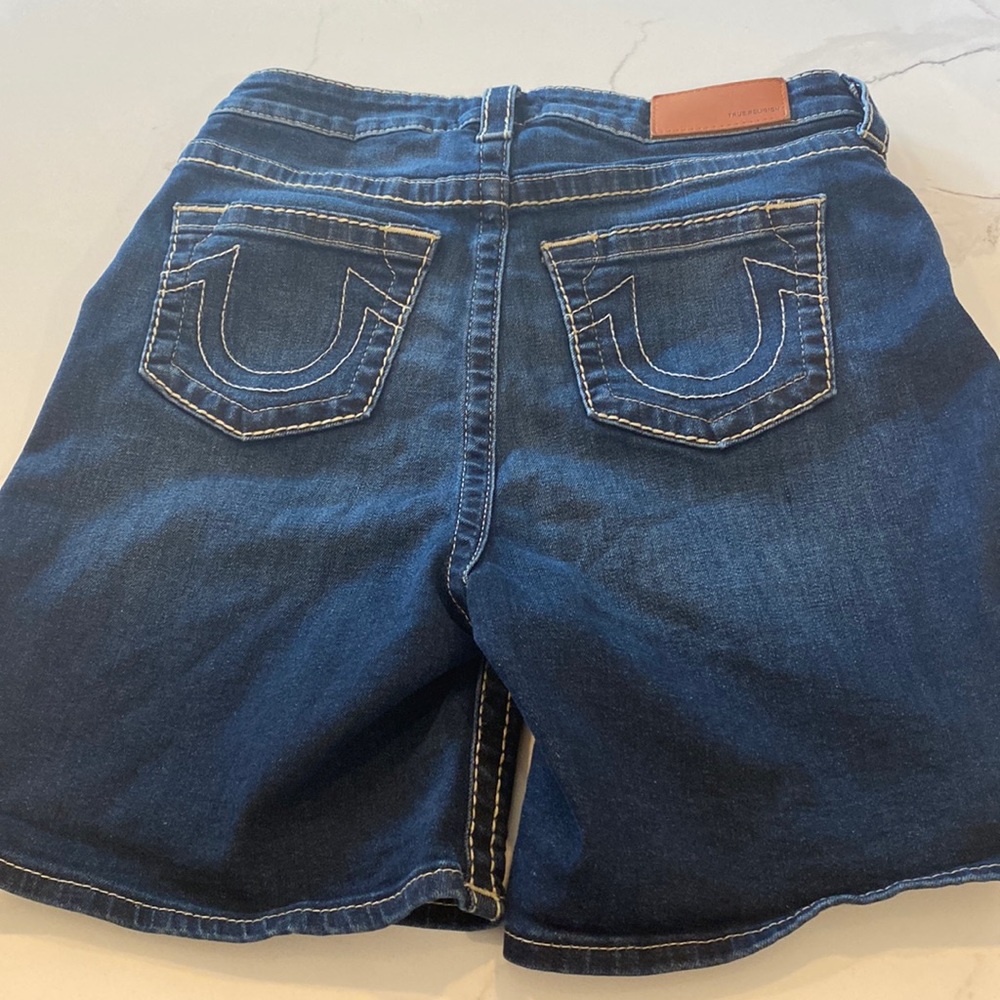True Religion “Jenny Curvy” jean shorts.